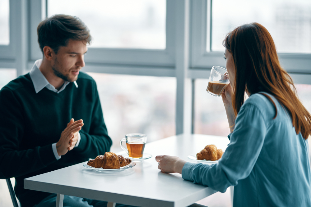 Couple Talking Over Breakfast - Testing the Waters