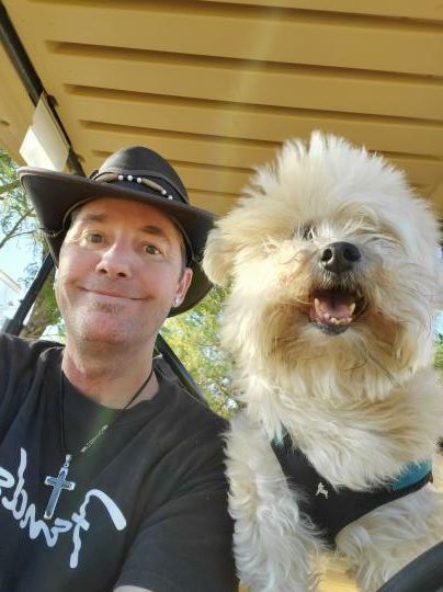 Me an my service dog Cesar out on the links